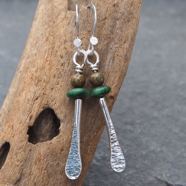Forged silver rod dangle earrings with Jade and Rhyolite beads.