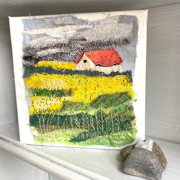 The cottage  across the fields-hand embroidered textile collage, on square canva