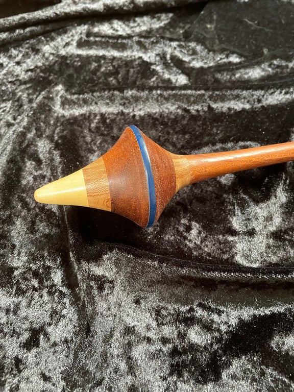 Support spindle set in mixed hardwoods