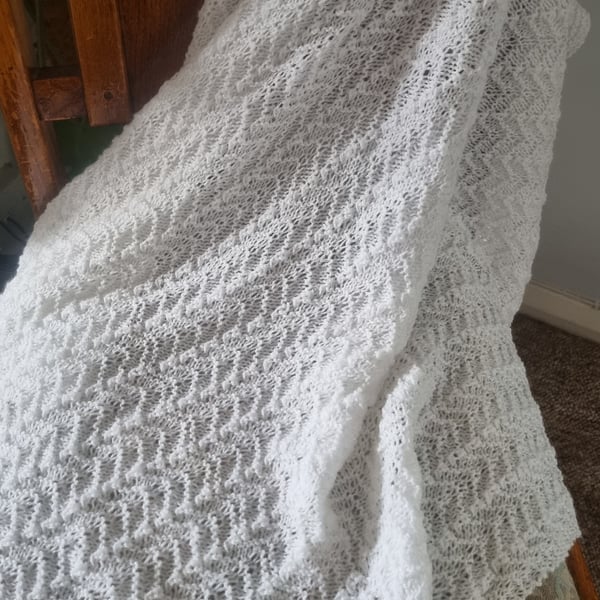 Handmade knitted white baby blanket, shawl