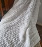 Handmade knitted white baby blanket, shawl
