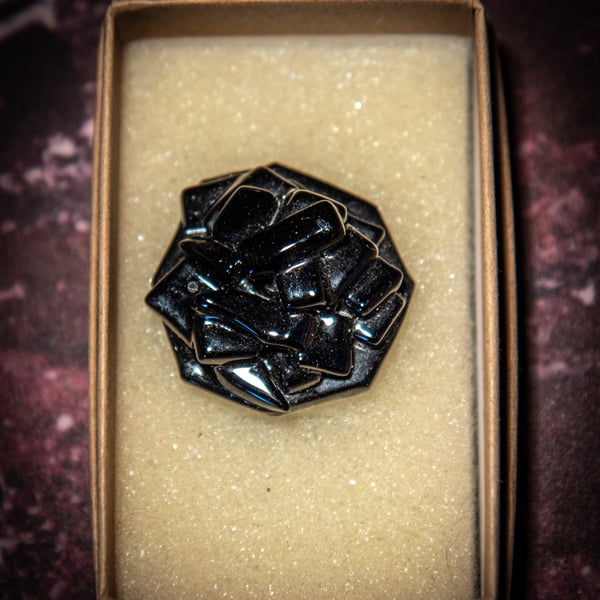 Unusual fused glass brooch in black. Complete with presentation box.