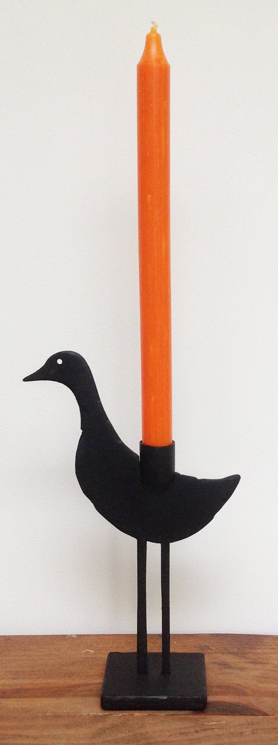 black sculptured metal duck candle holder