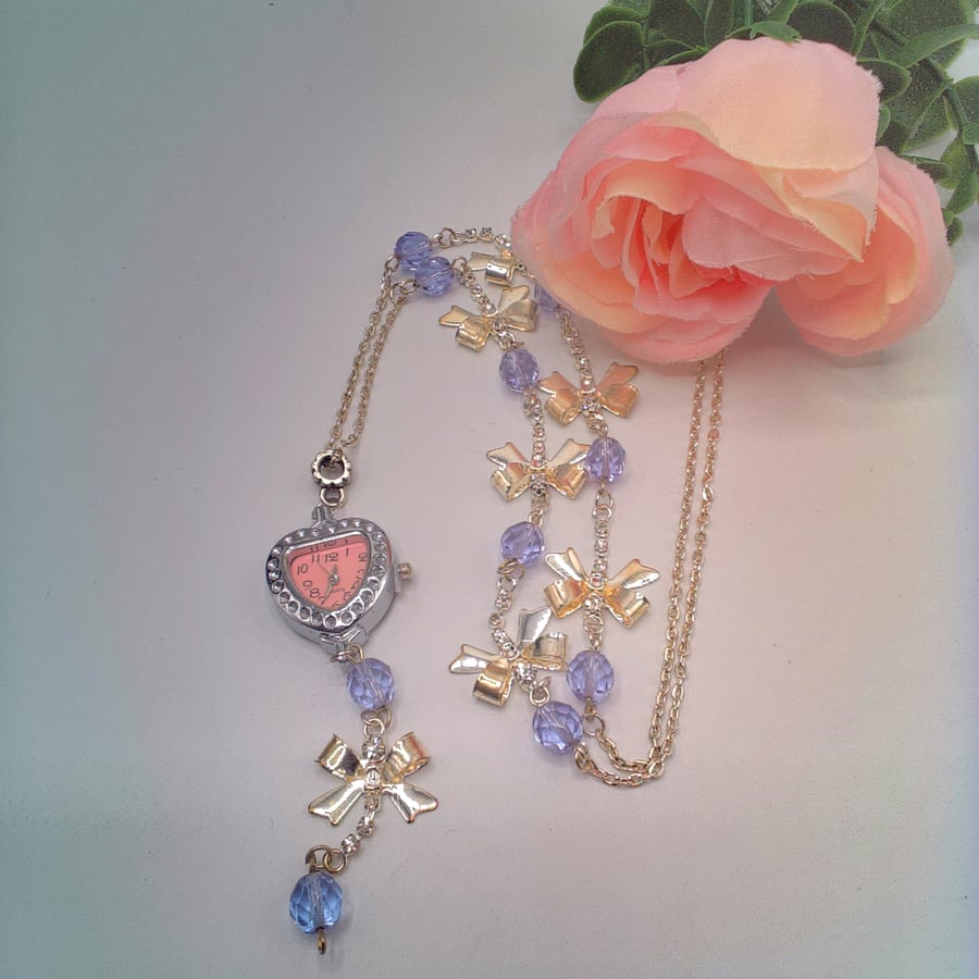 Heart Shaped Fob Watch on a Long Line Chain with Silver Bows and Lilac Crystals