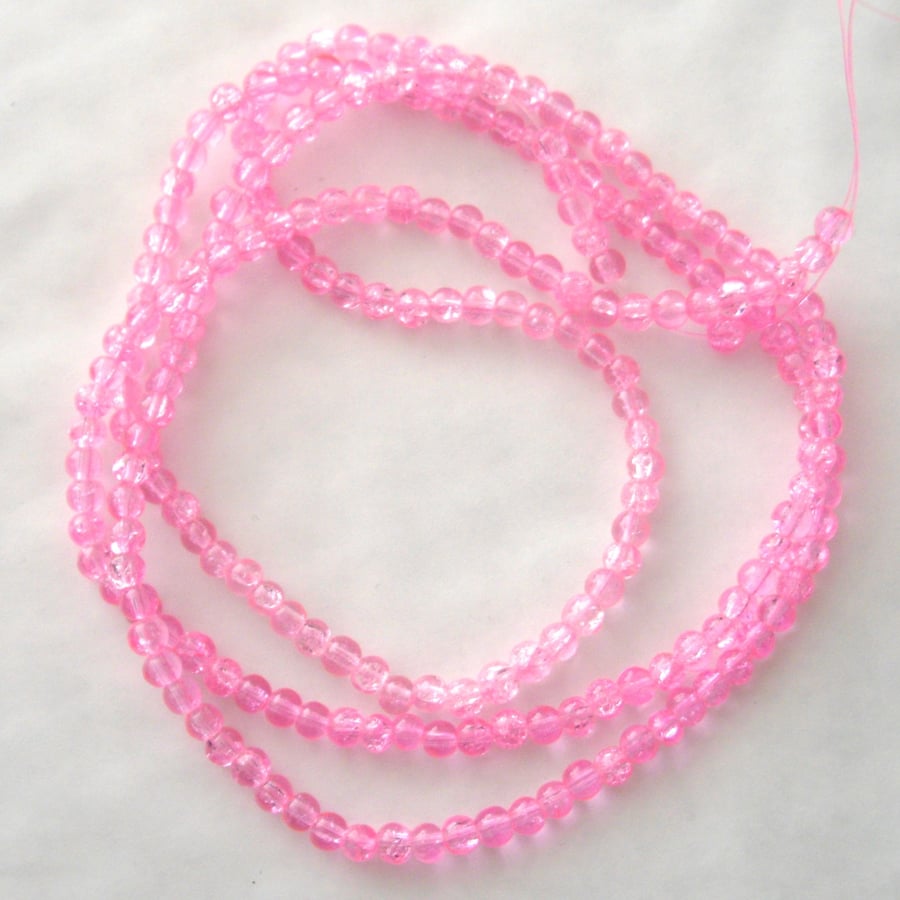 Long String of Pink Glass Crackle Beads