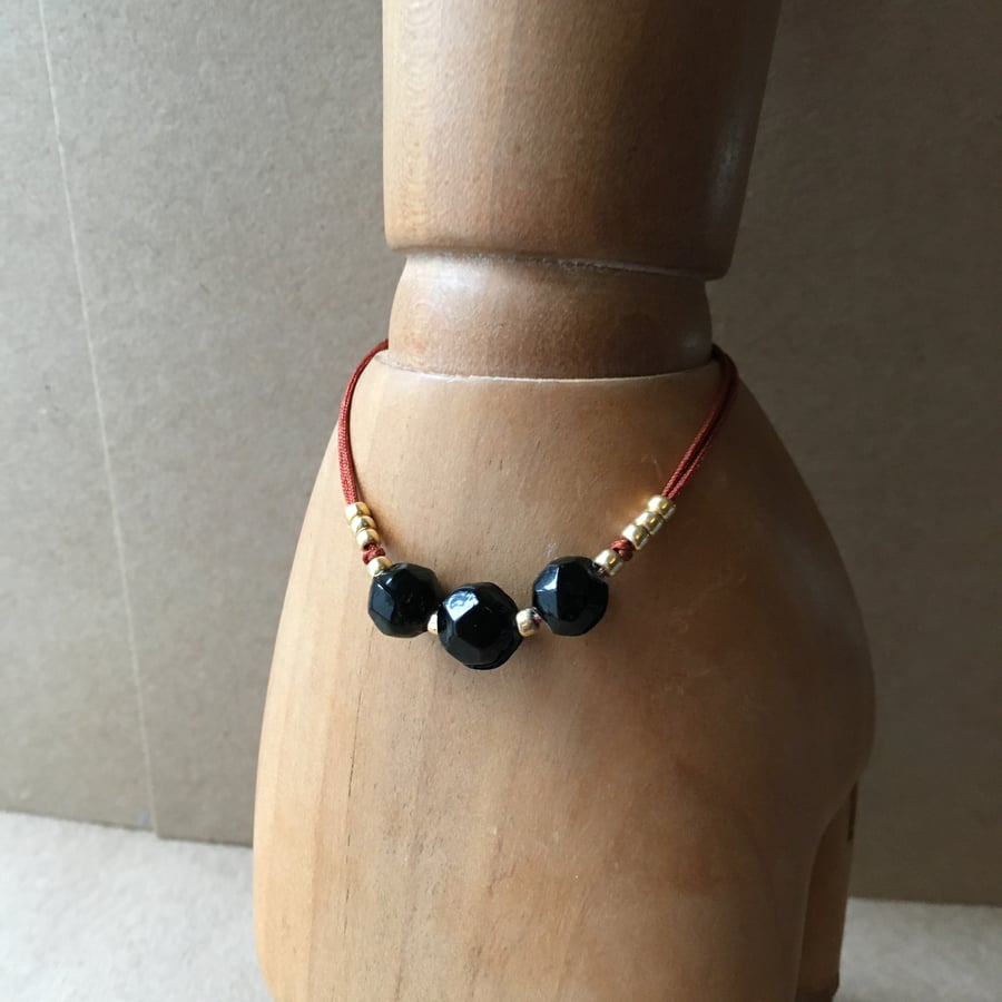 Up-cycled - Vintage black glass beads and black onyx beads adjustable bracelet 