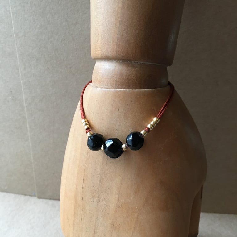 Up-cycled - Vintage black glass beads and black onyx beads adjustable bracelet 