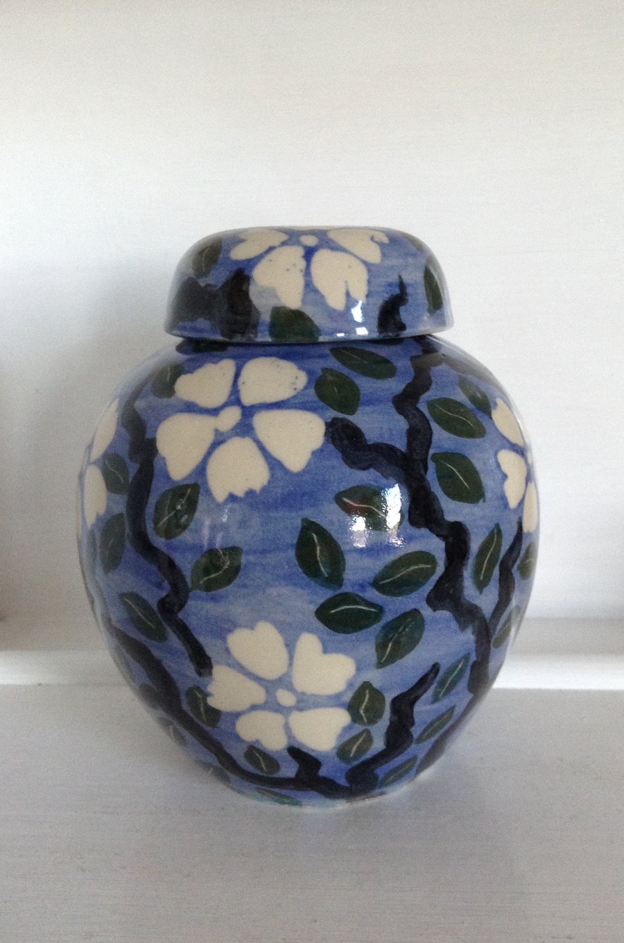 Storage jar or container in ginger jar shape with floral design