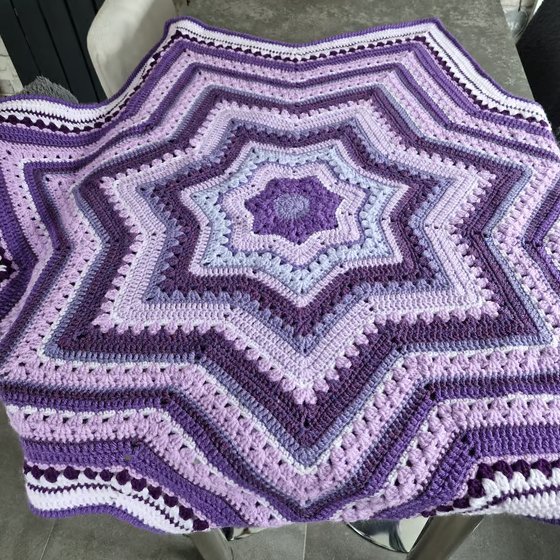Shades of purple crochet star shaped baby blanket