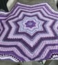 Shades of purple crochet star shaped baby blanket