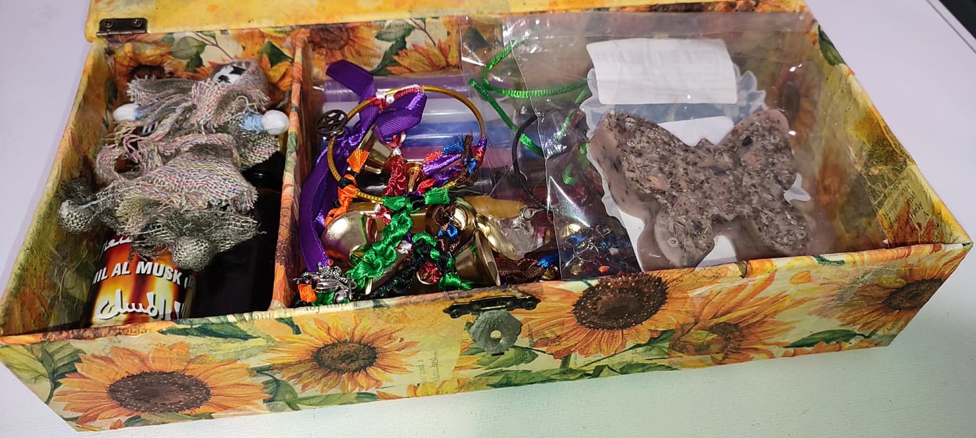 sunflower storage box filled with goodies candles witches bells jeweller crystal