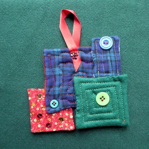 stitched textile hanging decorations