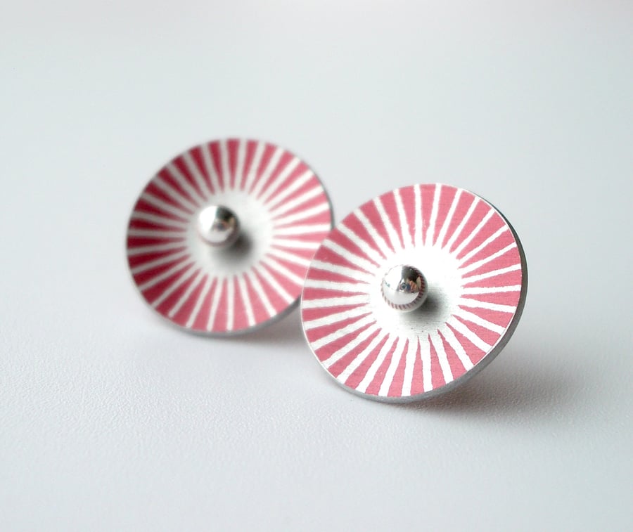 Red and silver sunburst circle studs