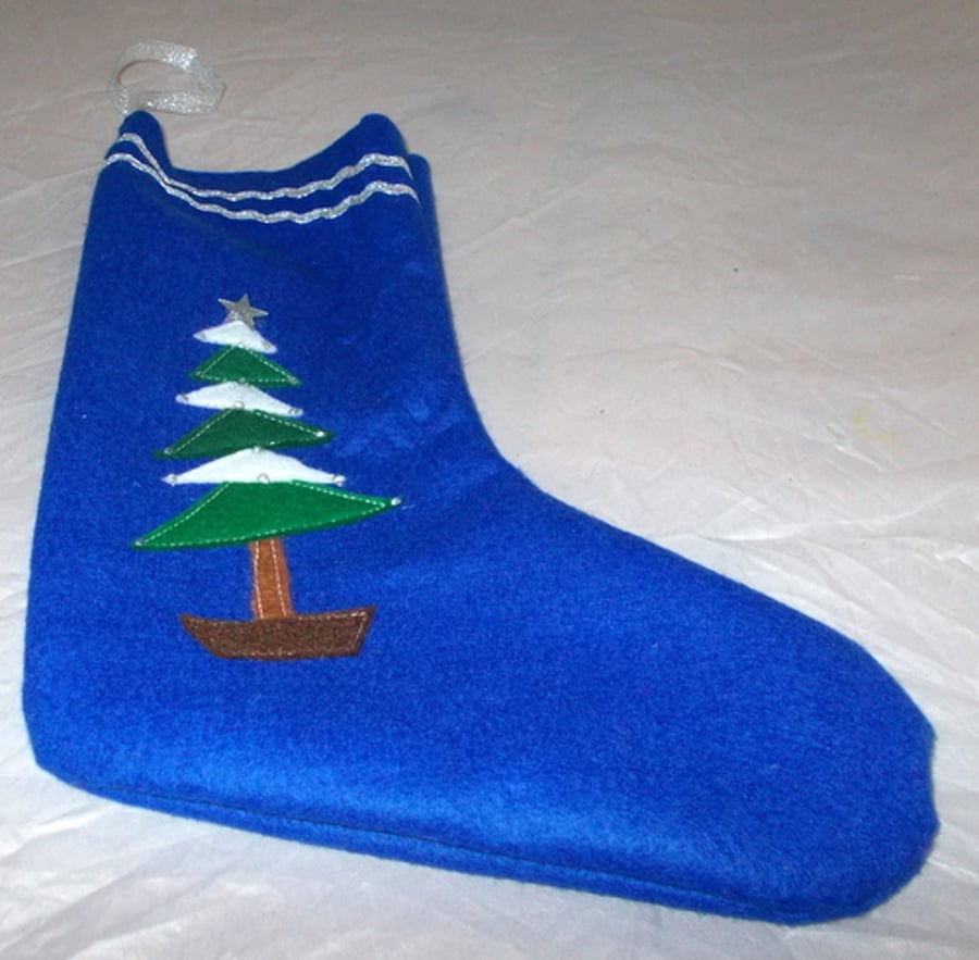 Hand made felt Christmas stockings with tree