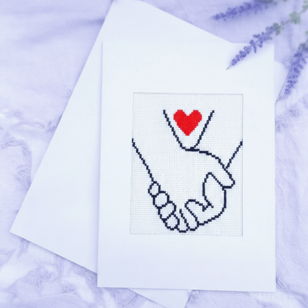 Handmade Cross Stitch Greeting Card Featuring Intertwined Hands and a Heart