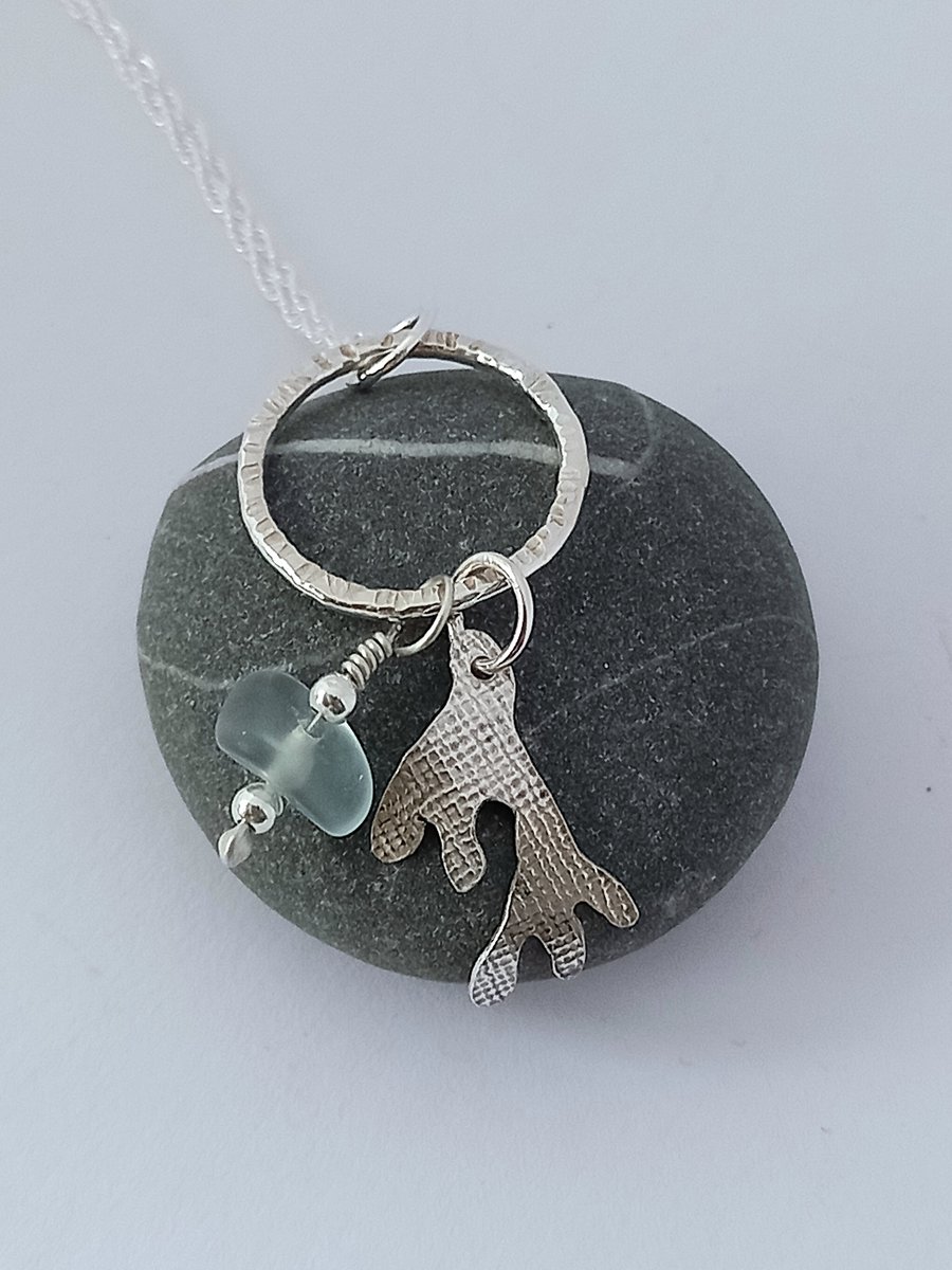 Silver seaweed pendant with seaglass bead