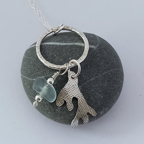 Silver seaweed pendant with seaglass bead