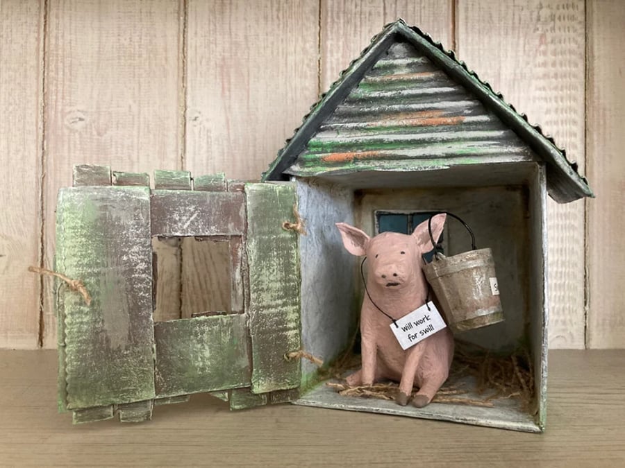 Paper mache pig in a barn assemblage art