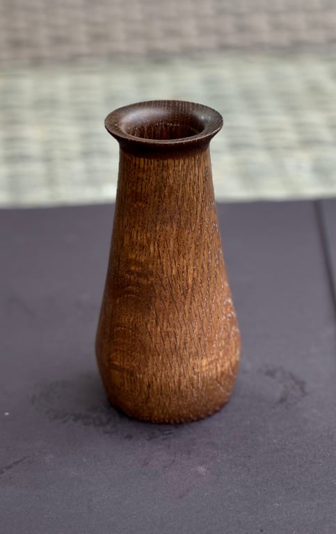 Ebonised oak vase