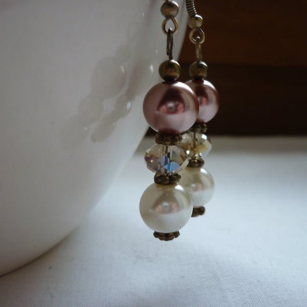 CINNAMON, IVORY AND CHAMPAGNE CRYSTAL EARRINGS.  754