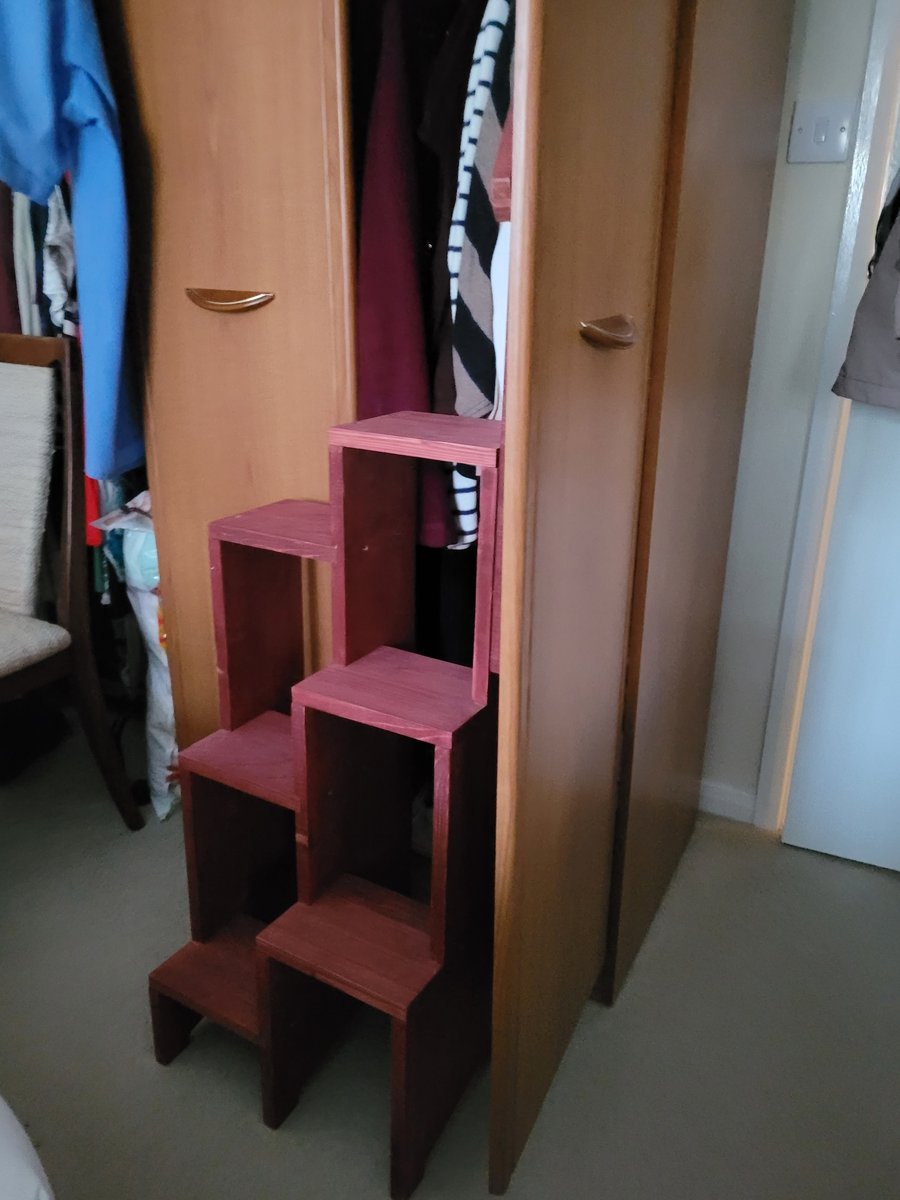 Step Up Easy "tm" branded step ladders with banister wood.