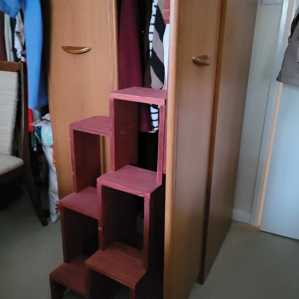 Step Up Easy "tm" branded step ladders with banister wood.