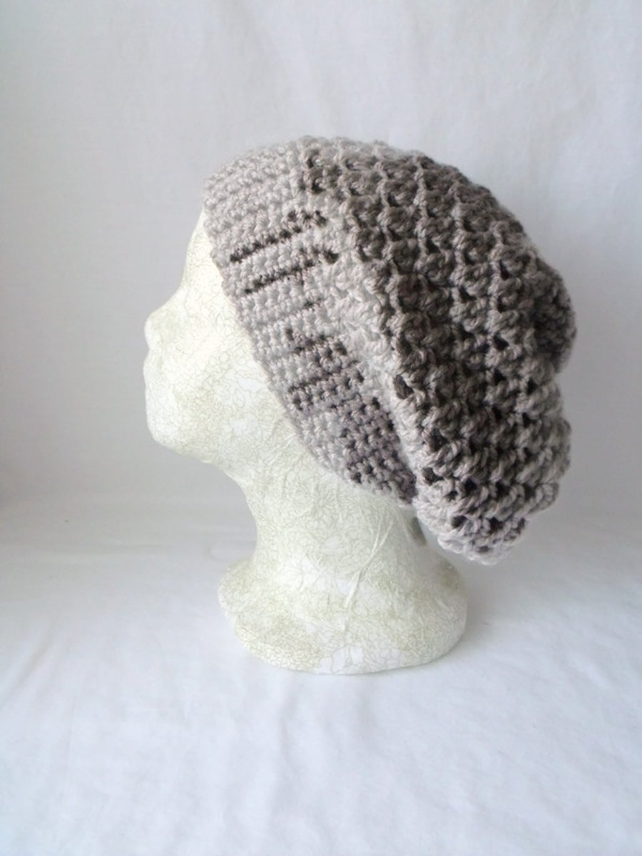 Taupe crocheted slouchie beanie hat with criss cross stitches