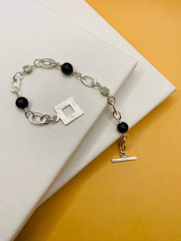 Type A Burmese jadeite bracelet with silver plated ovals