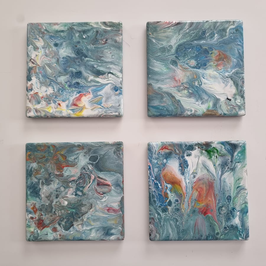 (23) Acrylic Art on Four Square Coasters showing a sort of nautical theme