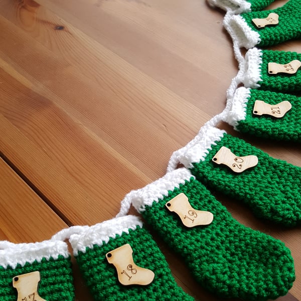 festive crocheted christmas stocking garland, green