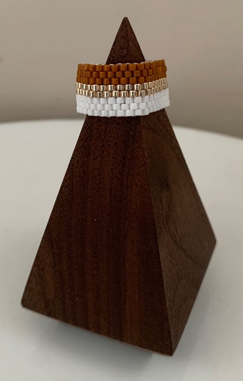 Light brown and white beaded ring