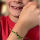 Made by Elijah. A beaded bracelet on elastic