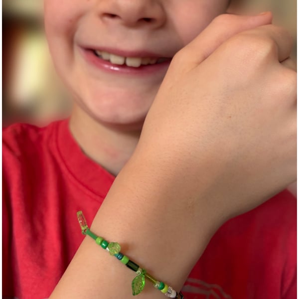 Made by Elijah. A beaded bracelet on elastic