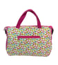 large toiletries bag made from  Liberty fabric, with handles and pockets in and 