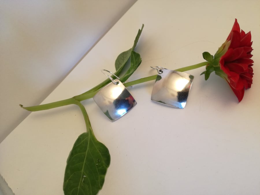 Domed polished silver diamond drop earrings