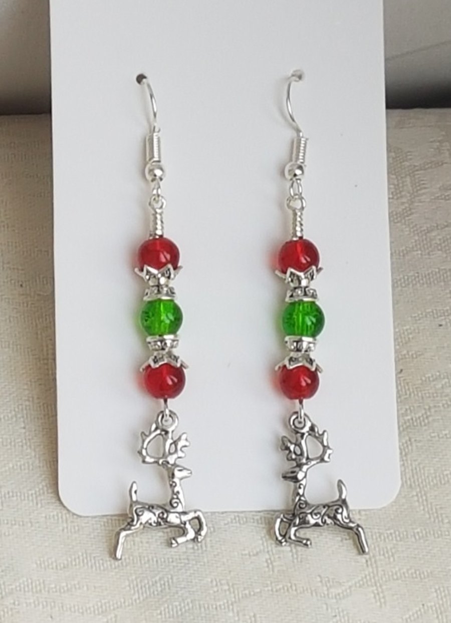 Festive Red and Green Glass Earrings with Reindeer Charms.