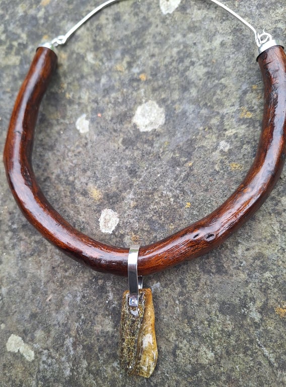 Unique necklace from driftwood and natural amber.