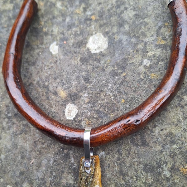 Unique necklace from driftwood and natural amber.