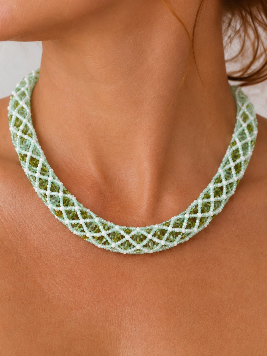 Netted rope necklace with green Swarovski bicone crystals and white seed beads