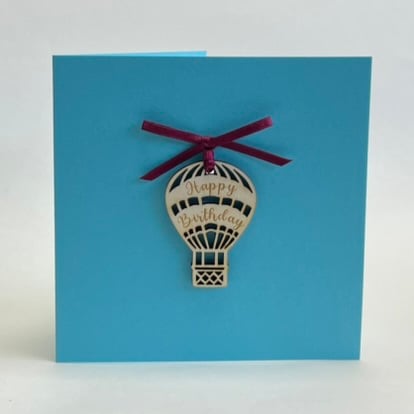 'Happy Birthday' card with detachable decoration