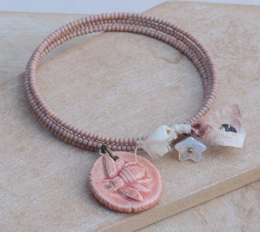 Dusky Pink Memory Wire Wrap Bracelet with Ceramic Bee Charm