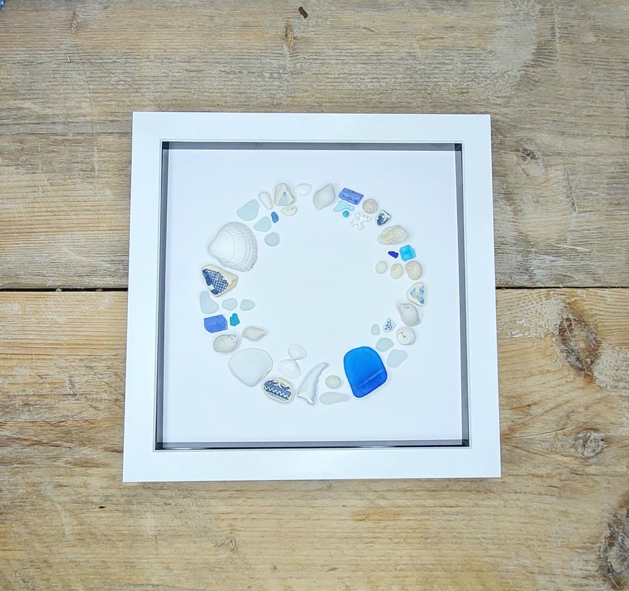 Cornish beach finds of blue and white shells and seaglass