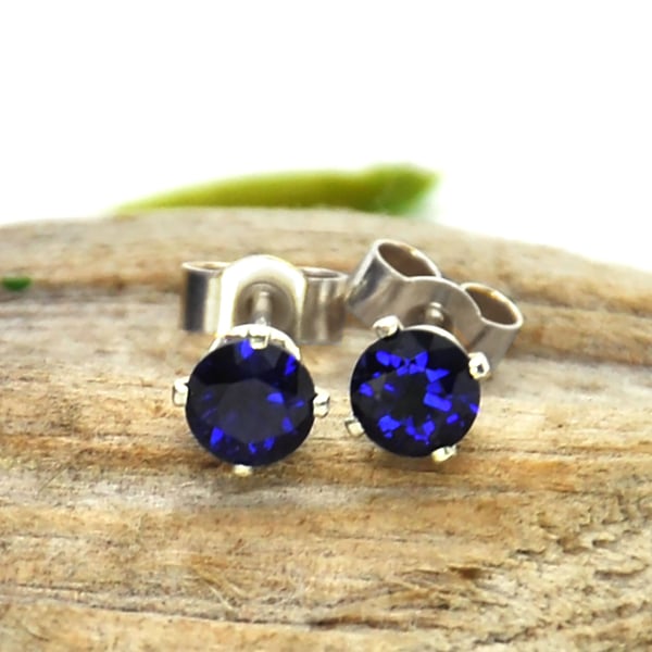 Silver blue sapphire stud earrings - claw set