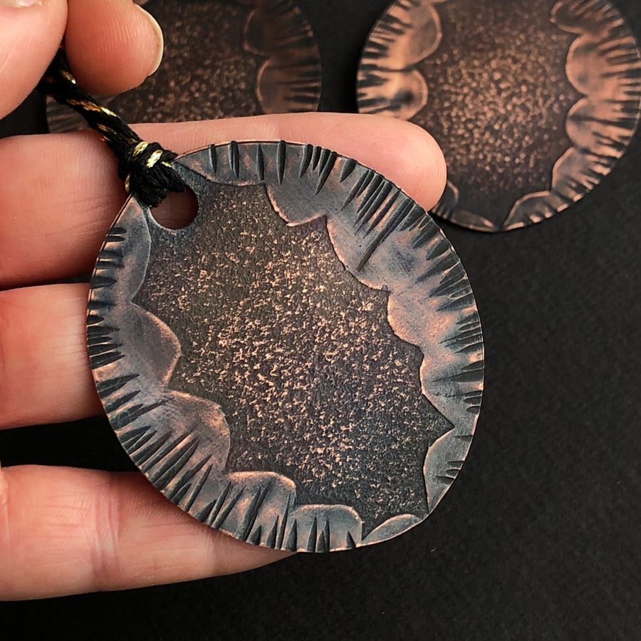 Copper tree decoration, oxidised copper decoration.