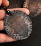 Copper tree decoration, oxidised copper decoration.