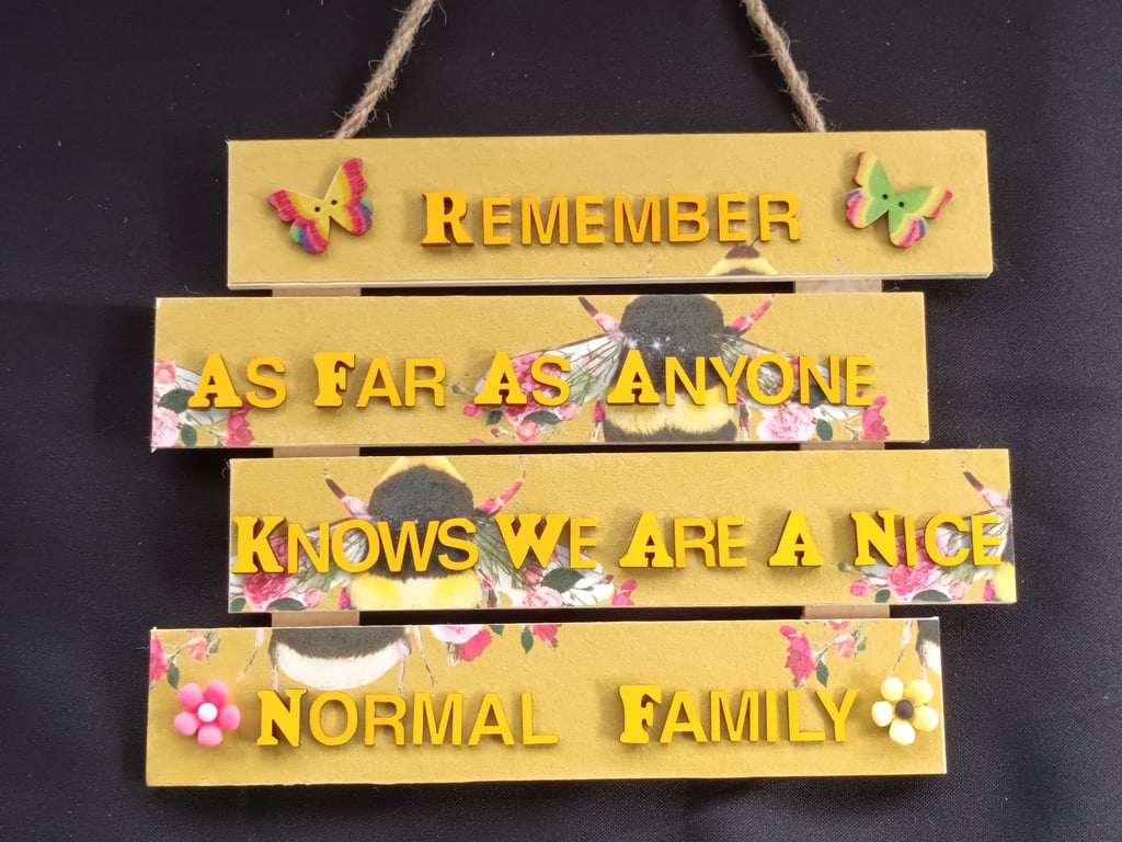 Hand decorated hanging wooden sign 