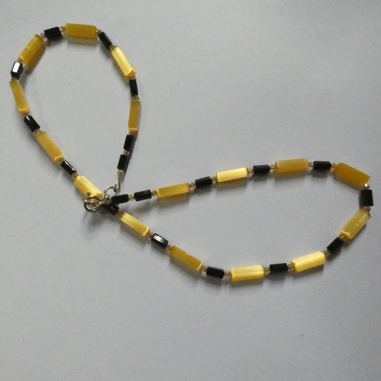 Art deco style black crystal & yellow cats eye beads single strand necklace