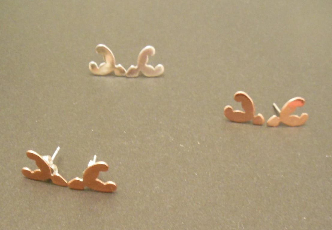 Stag head stud earrings in copper