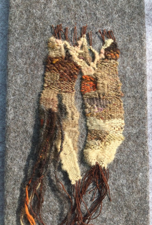 Mounted handwoven tapestry weaving,  textile art in browns, orange  and cream