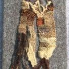 Mounted handwoven tapestry weaving,  textile art in browns, orange  and cream